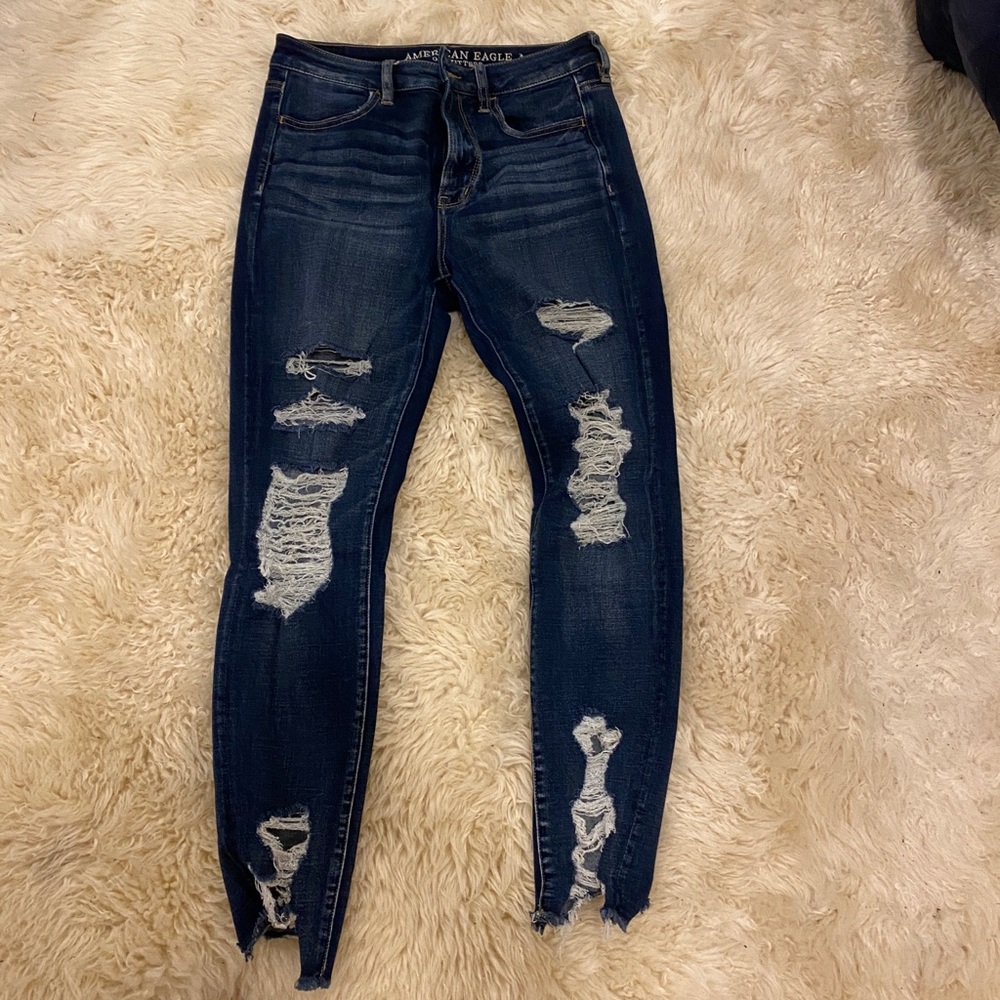 Ripped dark wash skinny jeans